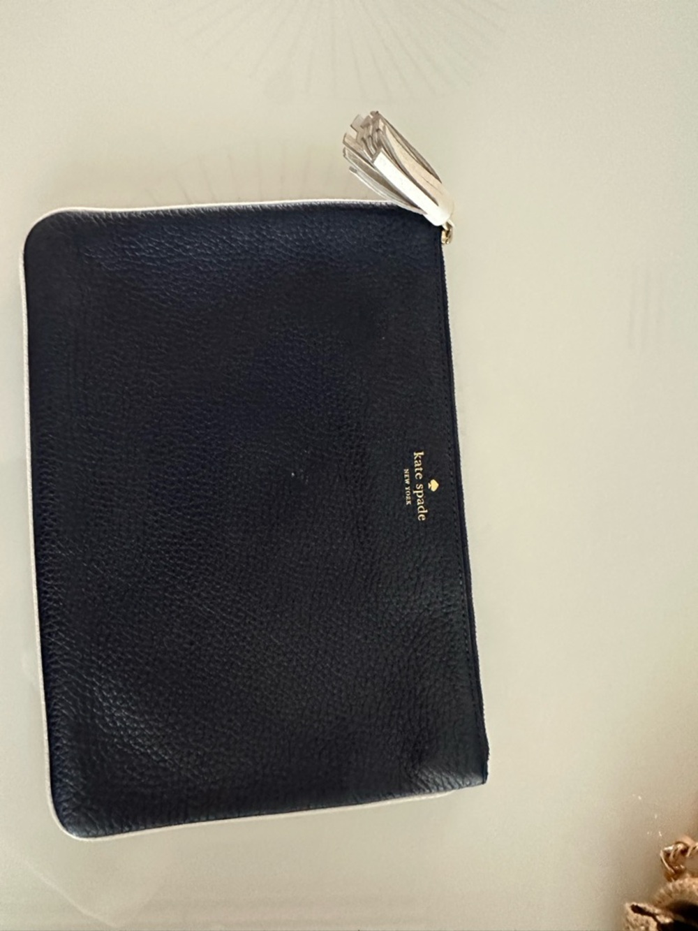 kate spade Black Leather Zip Pouch with Cream Tassel Pull
